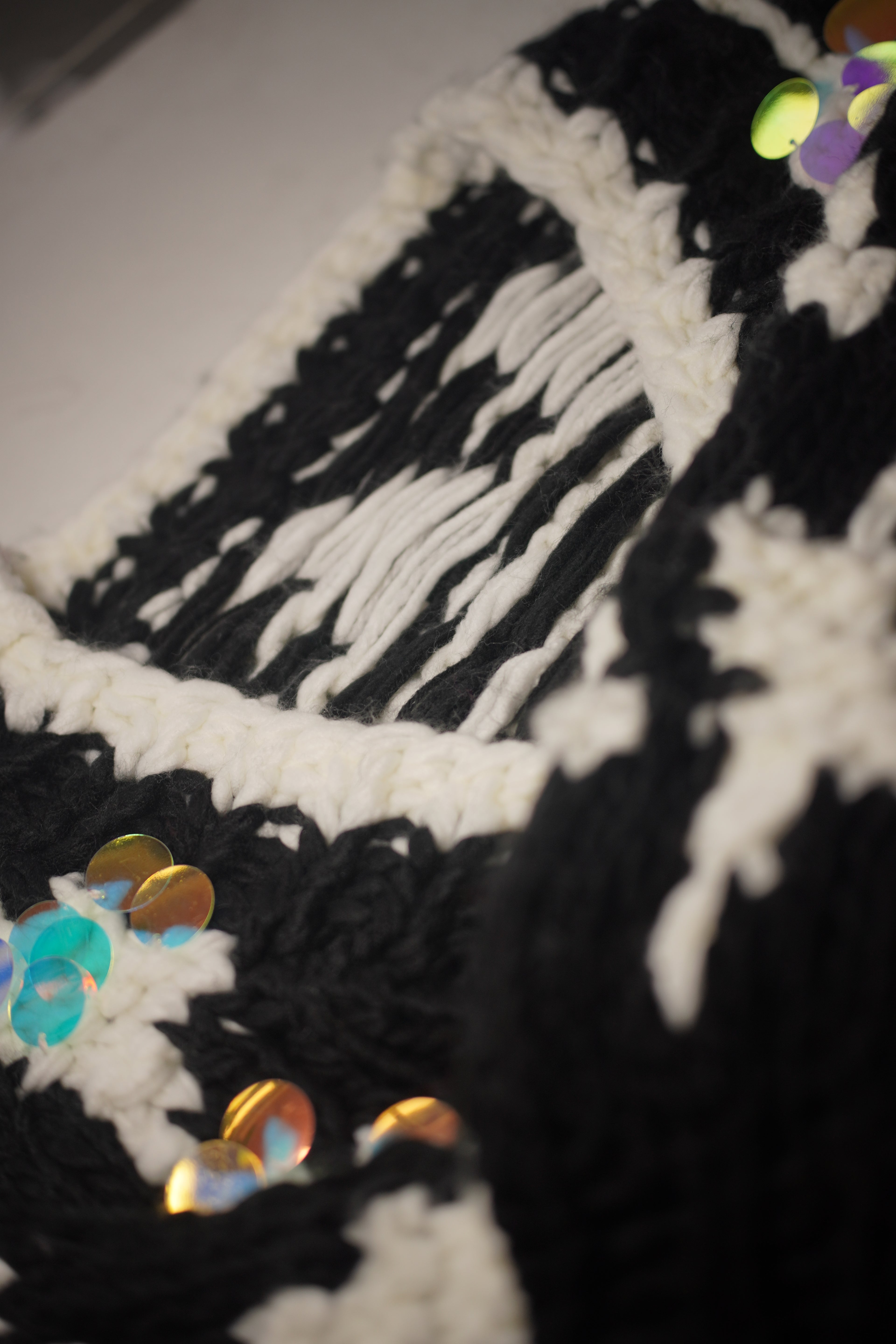cSequin Bloom — Hand-Knitted Cardigan in Black, White & Iridescent